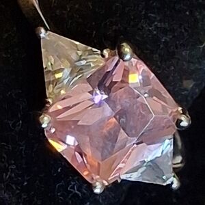 Sterling Silver Ring With Pink Ice CZ Flanked By Trilliant Cut Stones 10 3/4